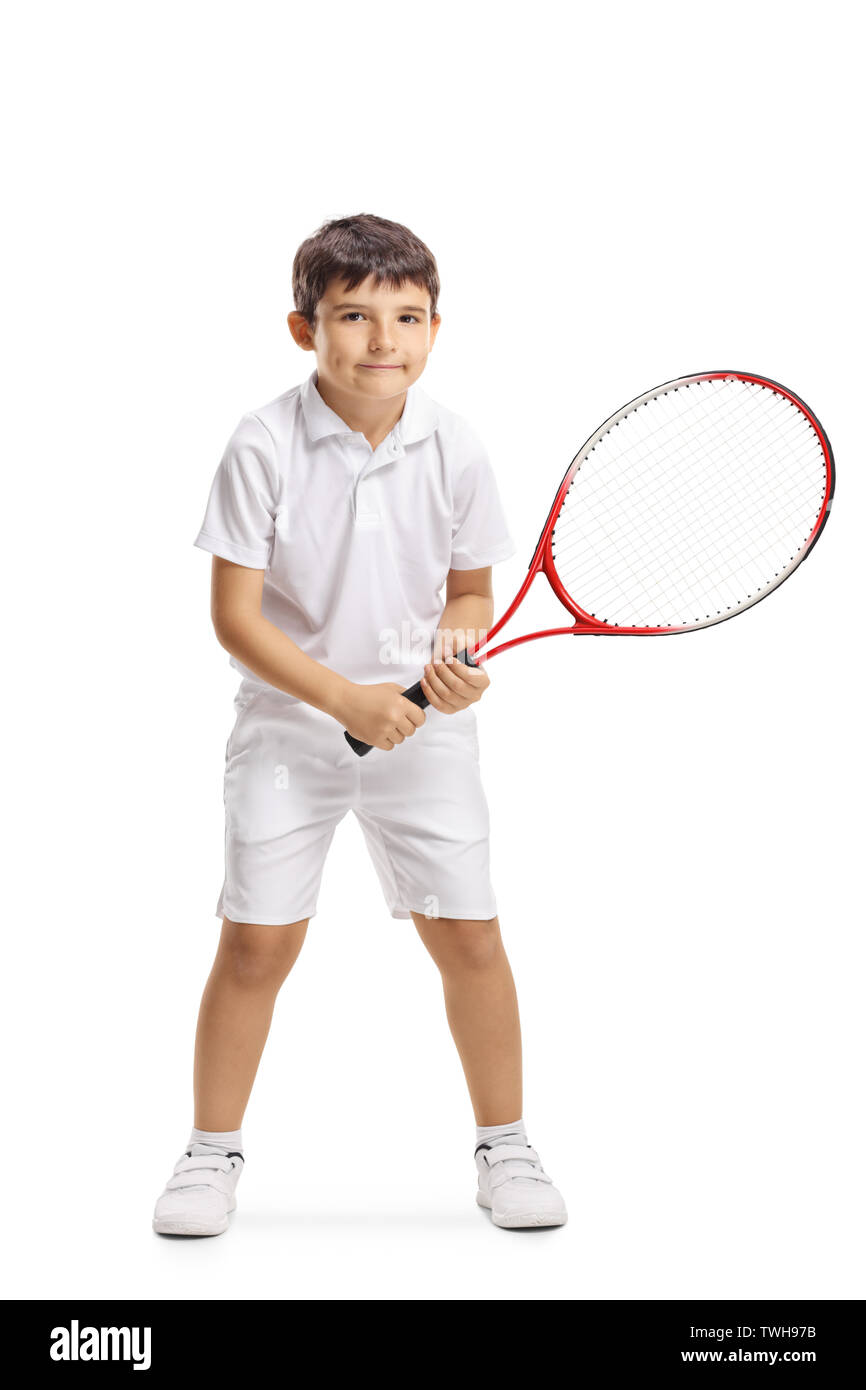 Full length portrait of a child tennins player posing with a racquet isolated on white background Stock Photo