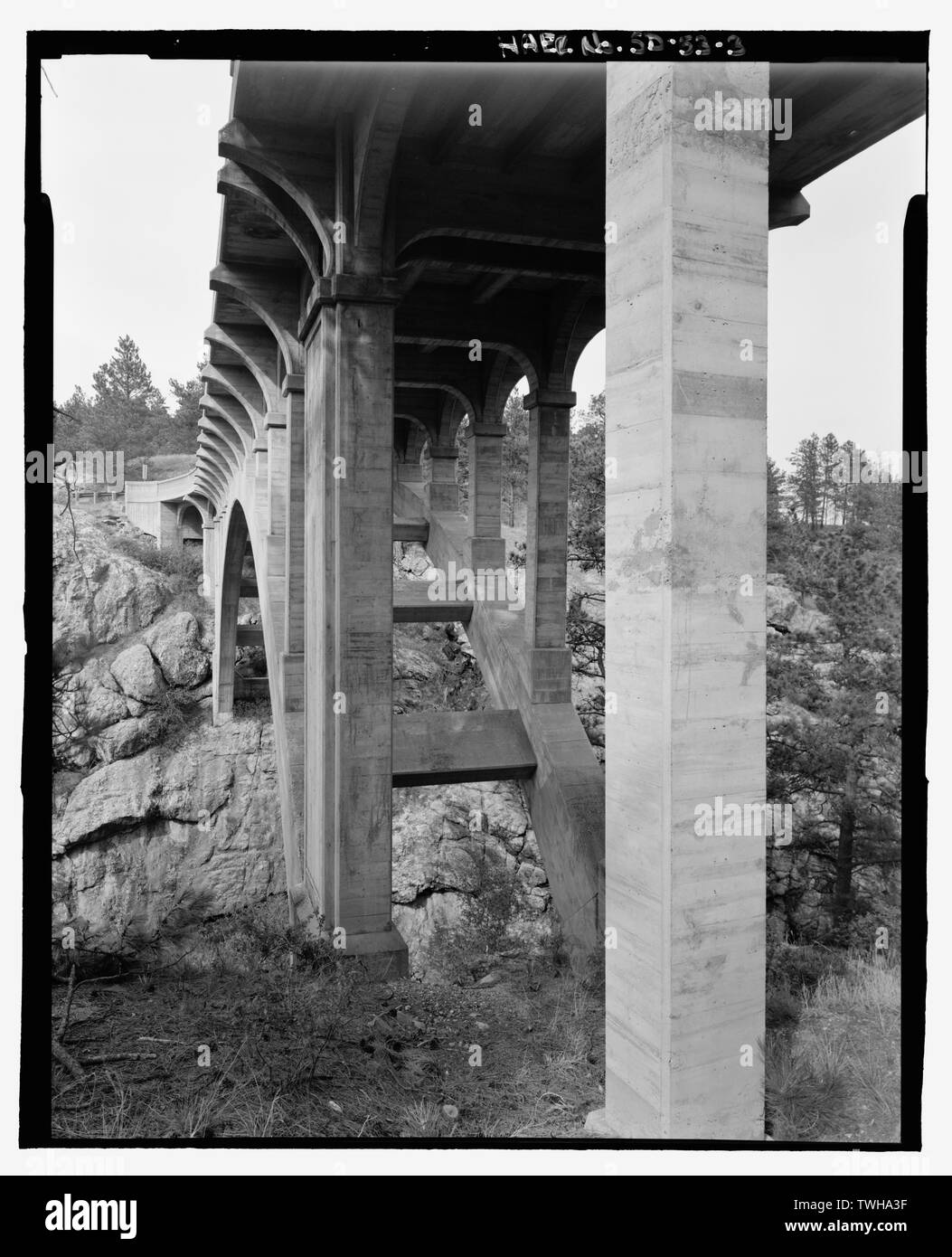 Route 87, Beaver Creek Bridge, underside view. View NE. - Beaver Creek Bridge, Hot Springs, Fall River County, SD; Hamilton, J Harper; Northwestern Engineering Company; Adelstein, Morris E; Linder, Jack A; Gray, Chris, field team project manager; Magdalenos, Christine, landscape architect; Marston, Christopher, project manager; Christianson, Justine, transmitter; Davis, Tim, historian; Delyea, Todd, delineator; Grinstead, Tim, delineator; Heckaman, Stacey, delineator; Michel, Roger, delineator; Tichi, Claire, historian; Haas, David, photographer Stock Photo