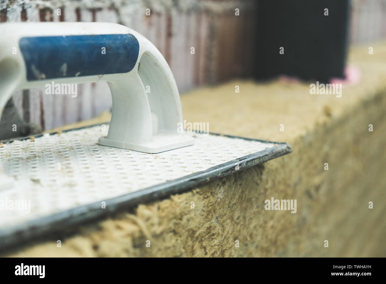 Spreading trowel on the rock wool insulation panels Stock Photo Alamy