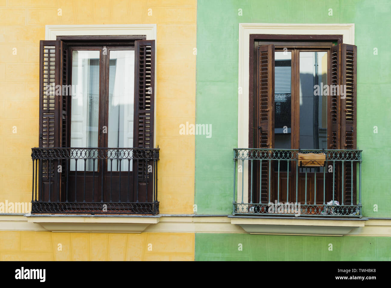 yellow and green color colorful building facade with windows. modern german  european architecture style Stock Photo - Alamy