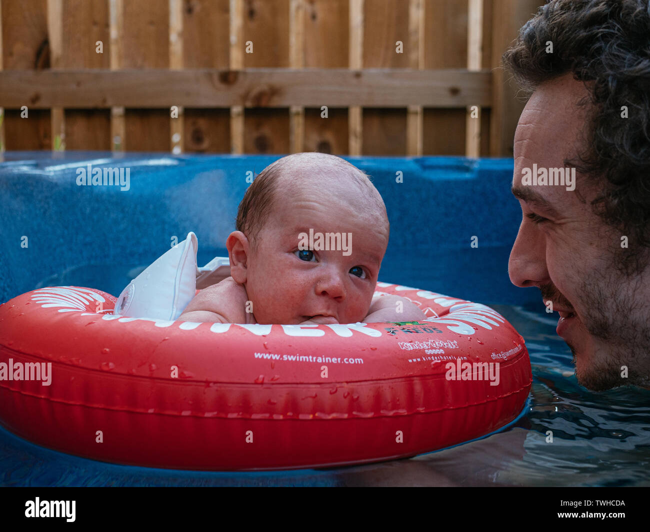 Newborn Baby in Bath with Parent Stock Photo Alamy