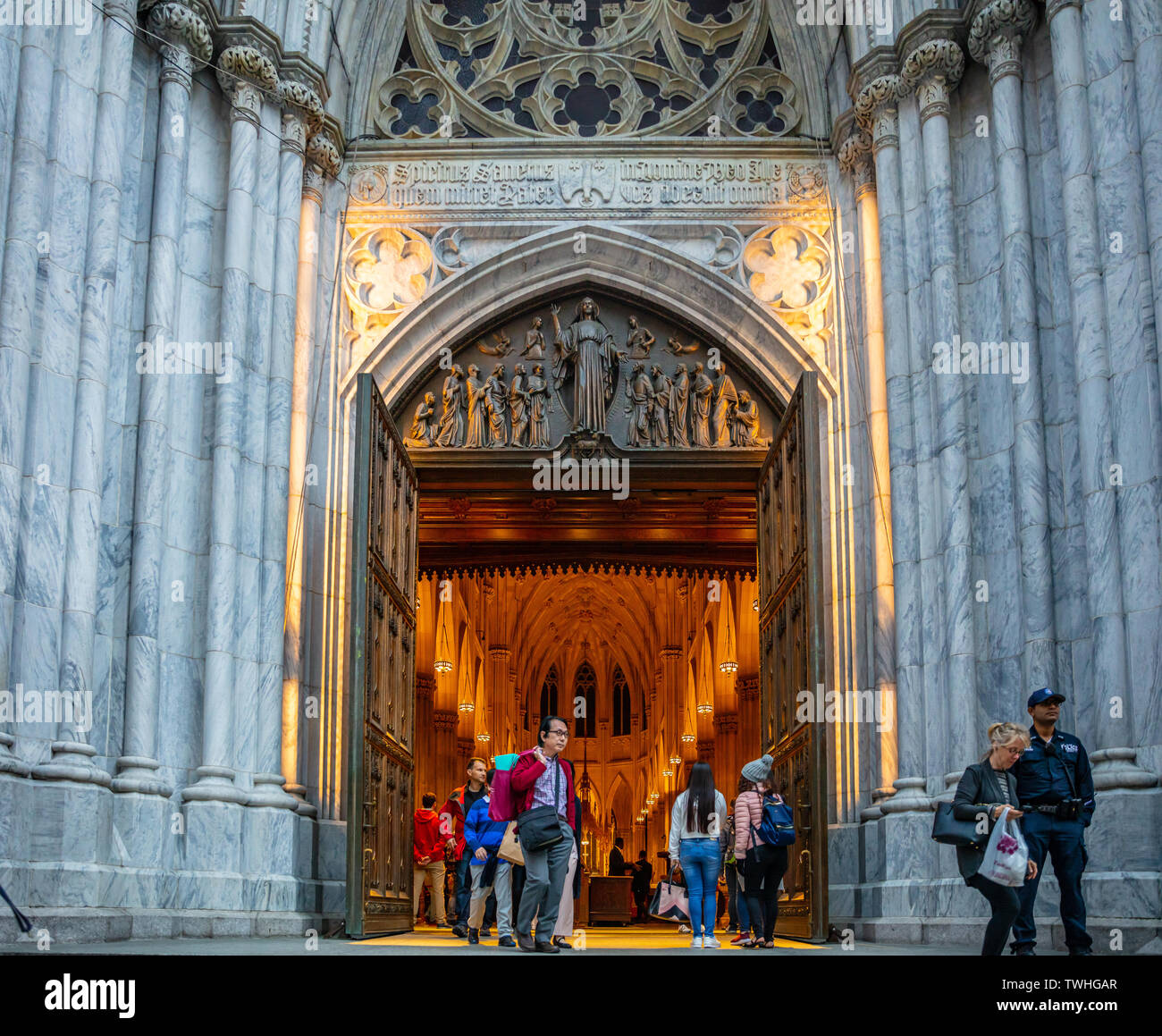 New York, United States, May 3rd, 2019. Tourists at St Patricks cathedral entrance. Manhattan downtown Stock Photo