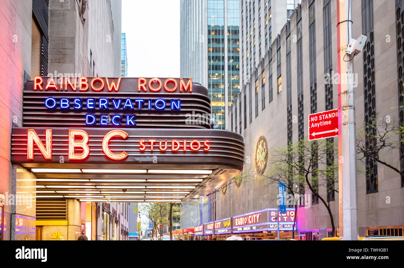 USA, New York, Manhattan. May 3, 2019. NBC studios entrance, colorful neon lights, downtown in the evening Stock Photo