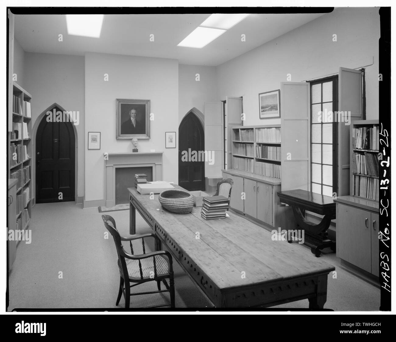 SECOND FLOOR, CENTER SOUTH ROOM WITH POINTED-ARCH DOORWAYS, LOOKING EAST (no other pointed-arch doorways elsewhere in this building) - County Records Building, 100 Meeting Street (at Chalmers Street), Charleston, Charleston County, SC Stock Photo