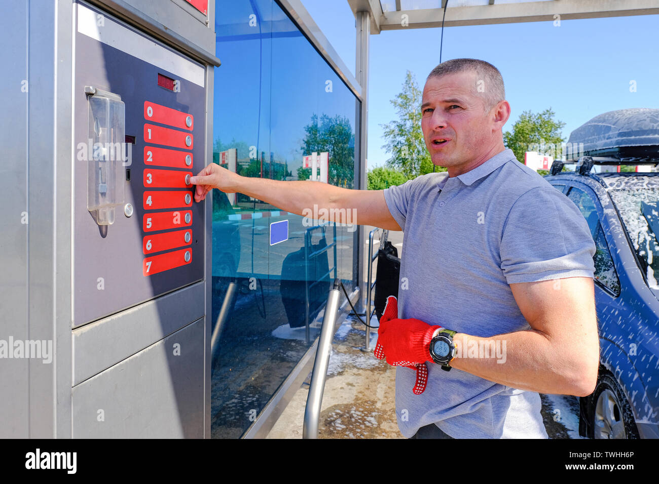 Payment for car wash services through the terminal. Car wash. Self