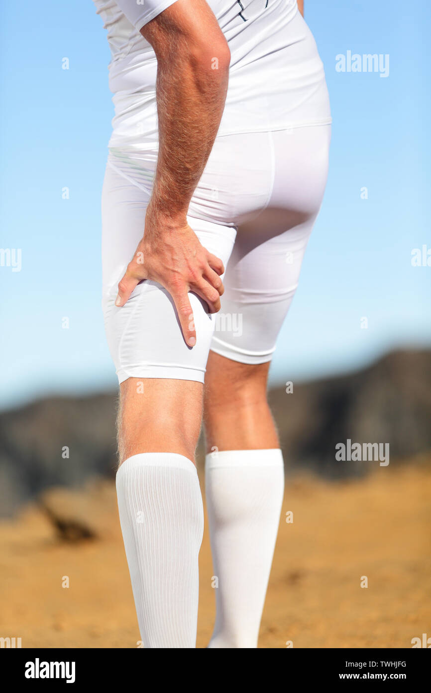 Running sports injury. Pulled hamstring muscle, muscle strain or muscle
