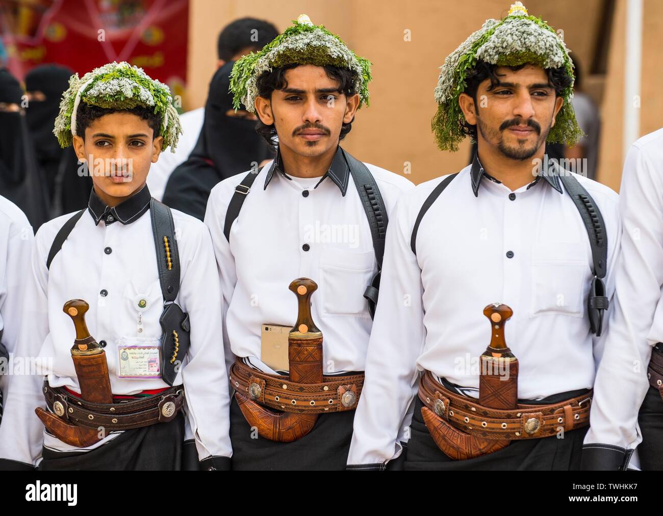 Traditional dressed men with with crooked dagger, Al Janadriyah Festival, Riad, Saudi Arabia Stock Photo