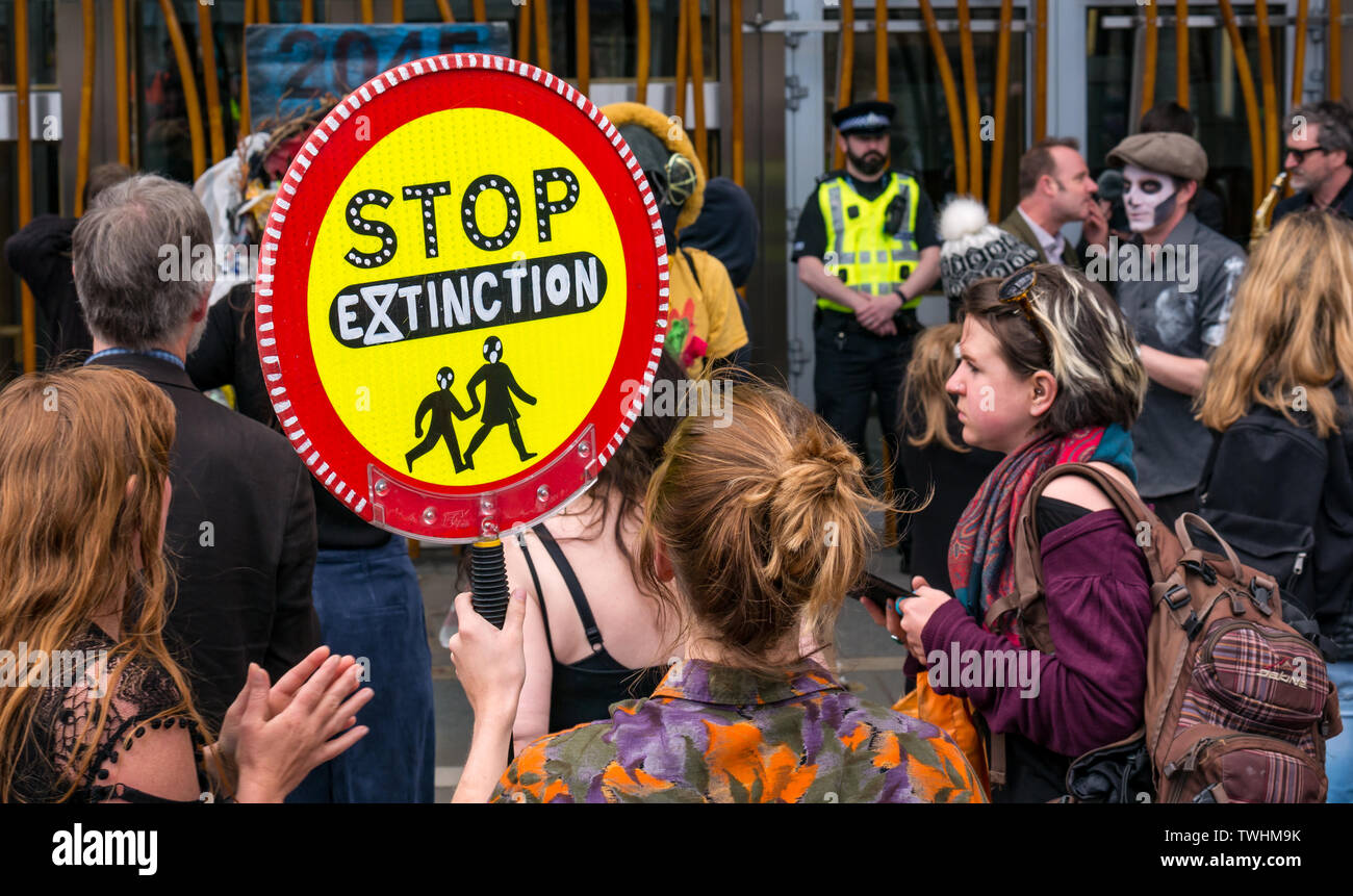 Extinction Rebellion Climate Change protestors in theatrical dancing mass die-in, Scottish Parliament, Edinburgh, Scotland, UK Stock Photo