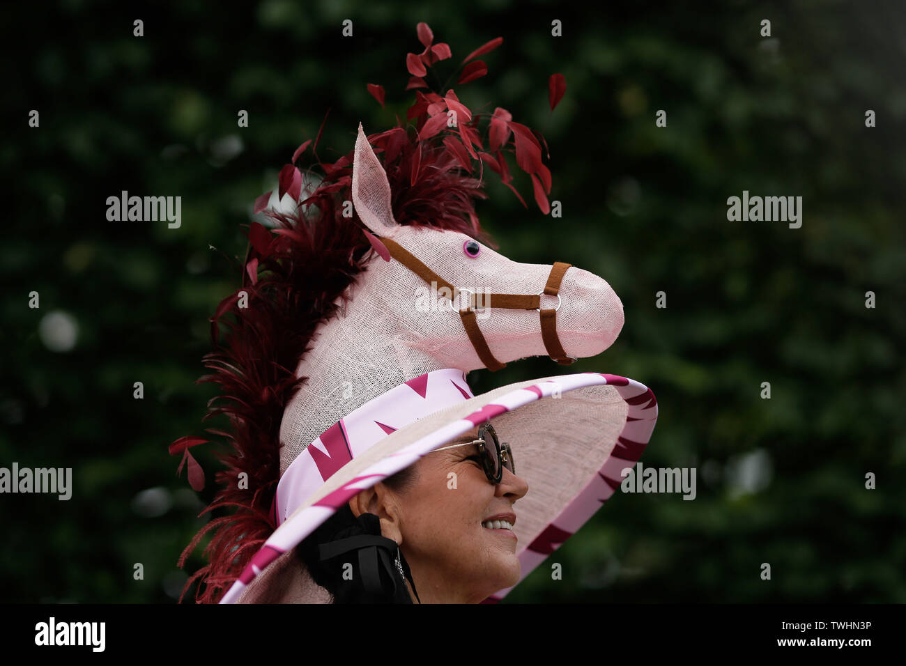 London, Britain. 20th June, 2019. A racegoer poses for a picture during Ladies Day of the Royal Ascot 2019 at Ascot Racecourse in Ascot, Britain, on June 20, 2019. Credit: Tim Ireland/Xinhua/Alamy Live News Stock Photo