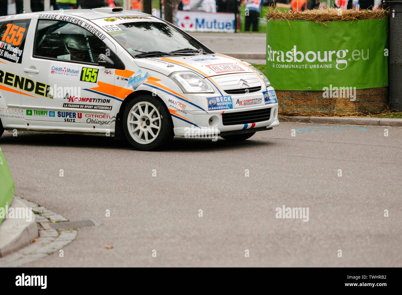 STRASBOURG, FRANCE - OCT 3, 2013: Yannick Wendling of France compete in Citroen C2 R2 during Super Special Stage 1 of the WRC France Stock Photo