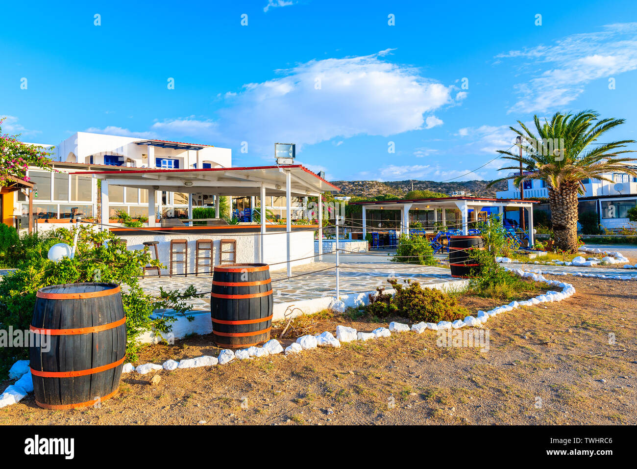 Typical Greek tavern in Ammopi village at sunrise time, Karpathos island, Greece Stock Photo