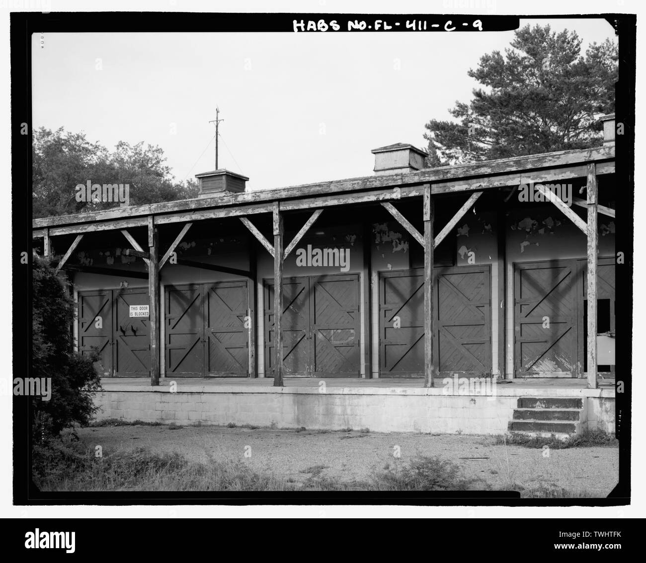 SHOP BAYS ON THE WEST FACADE, LOOKING NORTHEAST - Eglin Air Force Base, Motor Repair Shop, Northwest of Flager Road, Chisk Lane and southern edge of Weekly Bayou, Valparaiso, Okaloosa County, FL Stock Photo