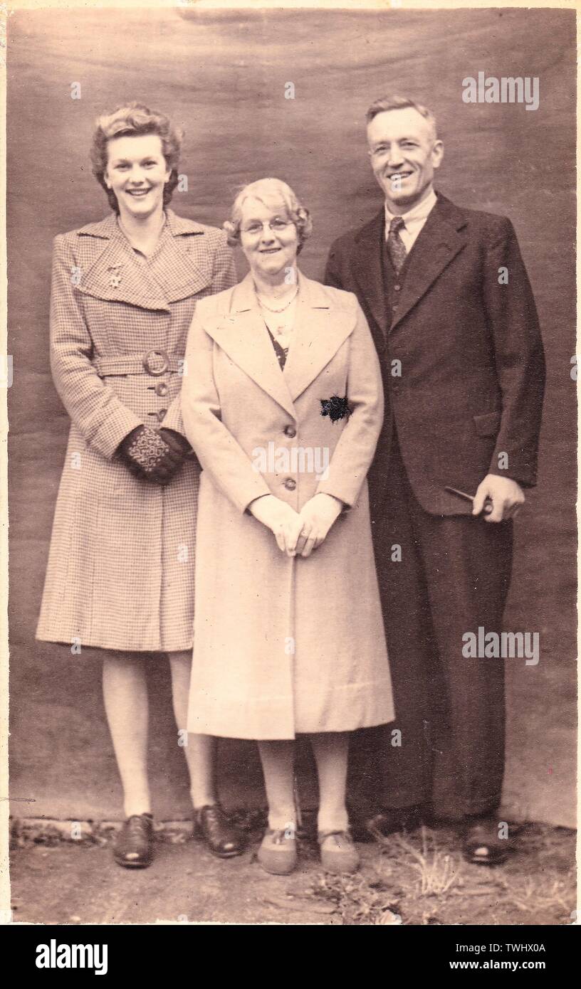 Vintage black and white photo of man and two women 1940s 1950s fashion Stock Photo
