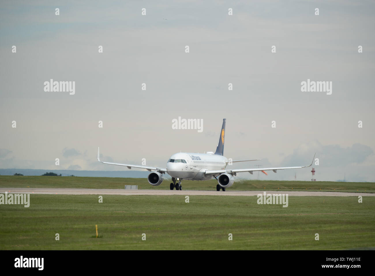A Lufthansa, also known as Deutsche Lufthansa AG, Airbus A320 prepares for take off from Manchester International Airport in Wilmslow, United Kingdom Stock Photo