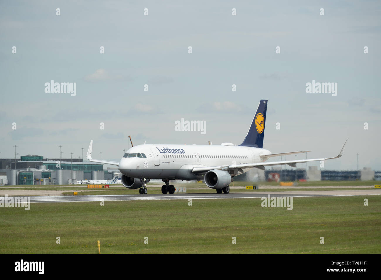 A Lufthansa, also known as Deutsche Lufthansa AG, Airbus A320 travels down Runway Two at