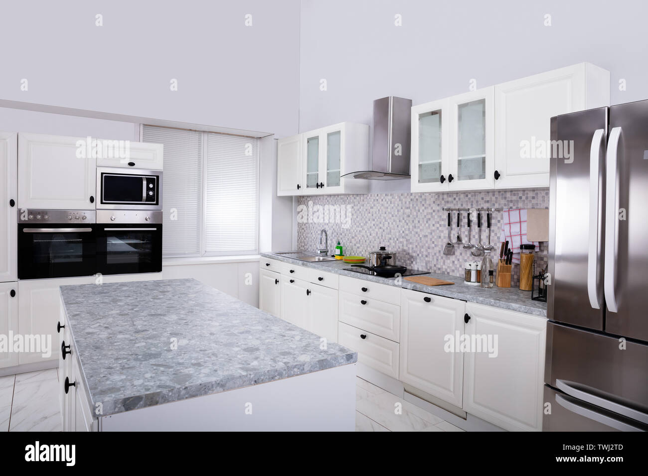 Interior Of Modern White Clean Kitchen With Microwave Oven And ...