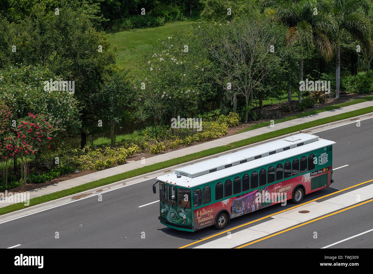 Orlando, Florida. June 05, 2019. View of green trolley in International