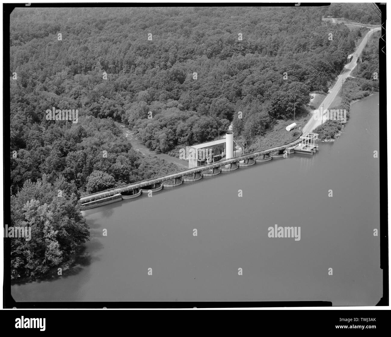 Secession Lake dam- aerial view of intake gates and road bed, from lake - Abbeville Hydroelectric Power Plant, State Highway 284 and County Road 72, Rocky River (historical), Abbeville County, SC; Abbeville Water and Electric Plant Company; Pennell, James Roy; White, W H; Abbeville Power Company Incorporated; D.M. Rickenbacker Construction Company; Townsend, C P; Wideman and Singleton; Britton, John B; S. Morgan Smith Company; Woodward Governor Company; Bethlehem Steel Company; Westinghouse Corporation; Bush Sulzer Brothers Company; Mark Brothers; Cary, Brian, transmitter Stock Photo