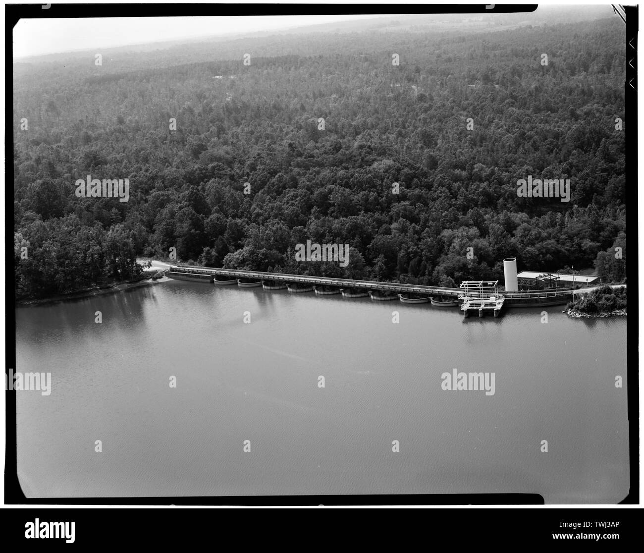 Secession Lake dam- aerial view from lake looking towards dam - Abbeville Hydroelectric Power Plant, State Highway 284 and County Road 72, Rocky River (historical), Abbeville County, SC; Abbeville Water and Electric Plant Company; Pennell, James Roy; White, W H; Abbeville Power Company Incorporated; D.M. Rickenbacker Construction Company; Townsend, C P; Wideman and Singleton; Britton, John B; S. Morgan Smith Company; Woodward Governor Company; Bethlehem Steel Company; Westinghouse Corporation; Bush Sulzer Brothers Company; Mark Brothers; Cary, Brian, transmitter Stock Photo