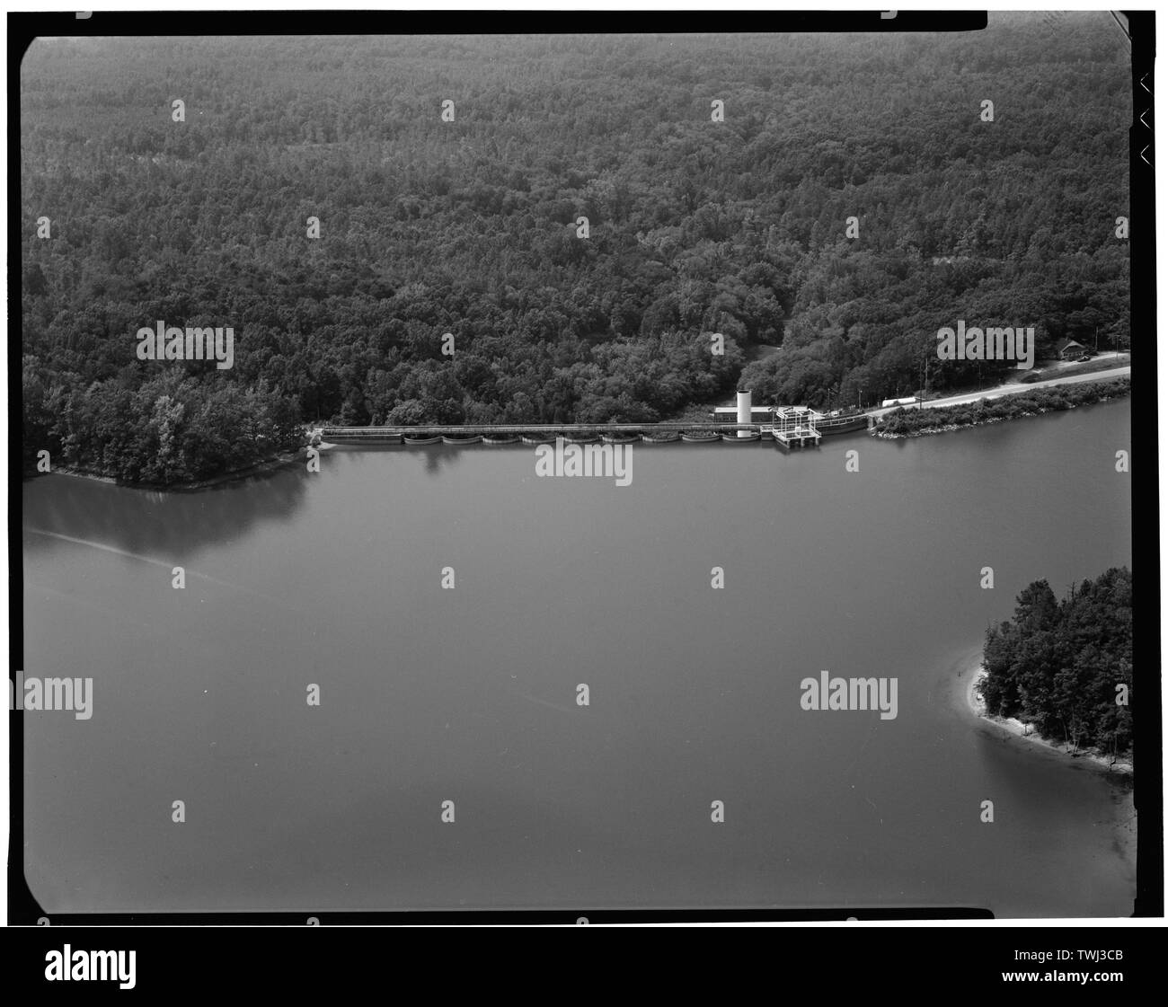 Secession Lake dam- general aerial view from lake towards dam - Abbeville Hydroelectric Power Plant, State Highway 284 and County Road 72, Rocky River (historical), Abbeville County, SC; Abbeville Water and Electric Plant Company; Pennell, James Roy; White, W H; Abbeville Power Company Incorporated; D.M. Rickenbacker Construction Company; Townsend, C P; Wideman and Singleton; Britton, John B; S. Morgan Smith Company; Woodward Governor Company; Bethlehem Steel Company; Westinghouse Corporation; Bush Sulzer Brothers Company; Mark Brothers; Cary, Brian, transmitter Stock Photo