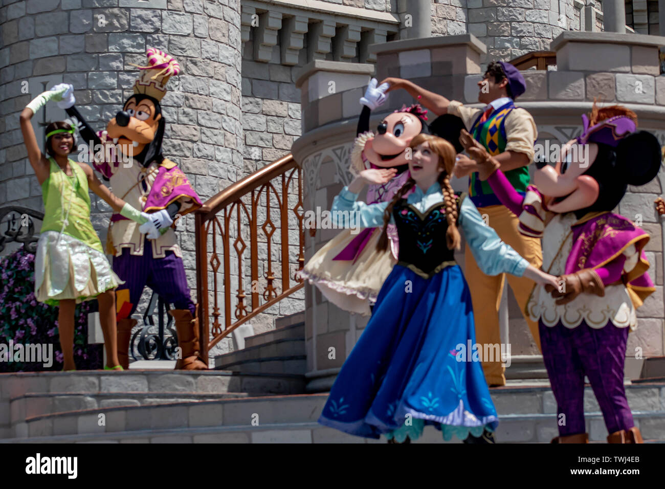 Orlando, Florida. May 17, 2019. Mickey, Anna, Goofy and Tiana on Mickey's Royal Friendship Faire on Cinderella Castle in Magic Kingdom at Walt Disney Stock Photo