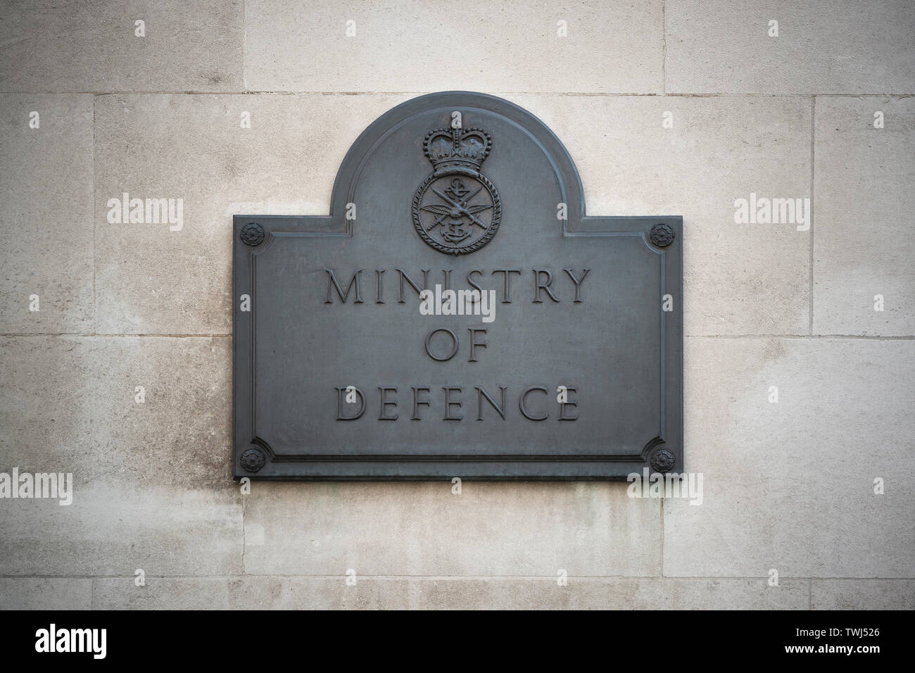 Signage for the Ministry of Defence outside the governmental department's offices on Whitehall in London, UK. Stock Photo