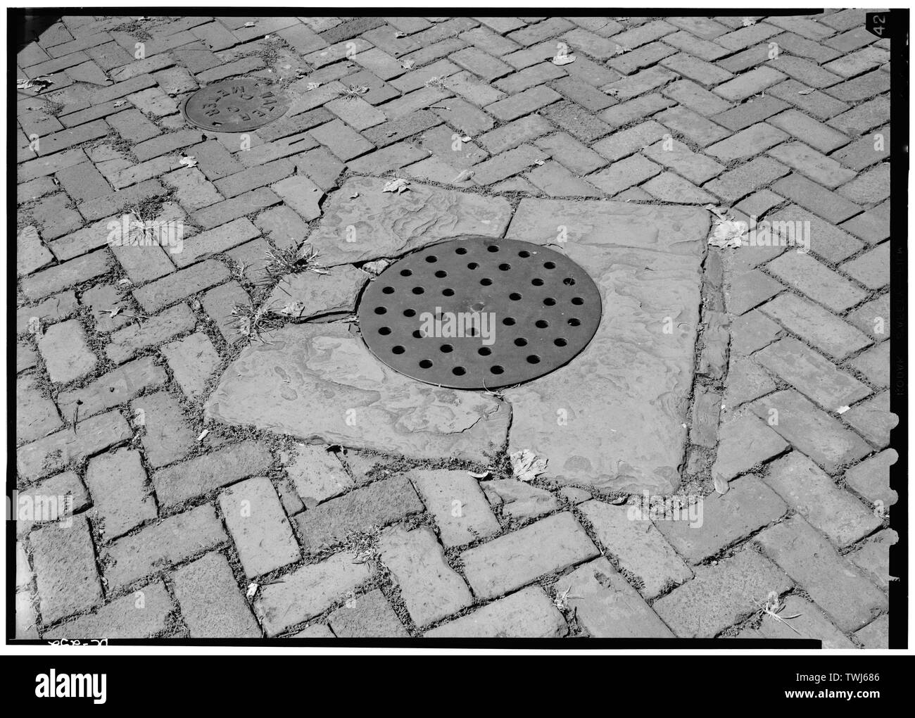September 1969 PERFORATED COAL CHUTE COVER 3041 N STREET, N.W. - Georgetown Street Furniture, Georgetown Vicinity, Washington, District of Columbia, DC Stock Photo