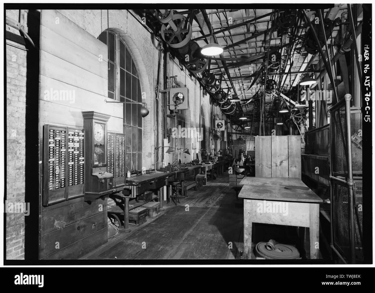 Side entry to laboratory from courtyard. Time clock used to record employees' work times. - Thomas A. Edison Laboratories, Building No. 5, West Orange, Essex County, NJ Stock Photo