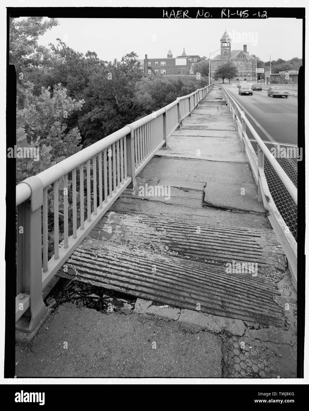 Sidewalk and railing detail, view east - Court Street Bridge, Court Street spanning Blackstone River and Truman Drive, Woonsocket, Providence County, RI; Sweet, Arthur; Aifson, Mary, transmitter; Usher, Aaron, photographer; Edward Connors and Associates, historian Stock Photo
