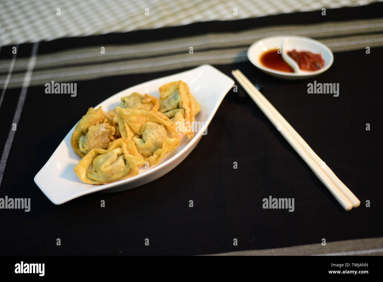 deep fried won ton, setup nicely on a table ready to serve Stock Photo