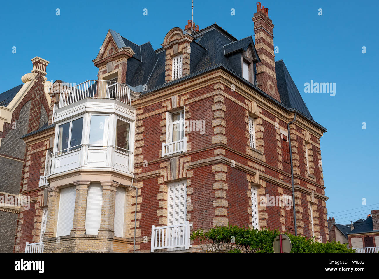 Typical houses and beach cabins of Houlgate, Normandy, France Stock Photo