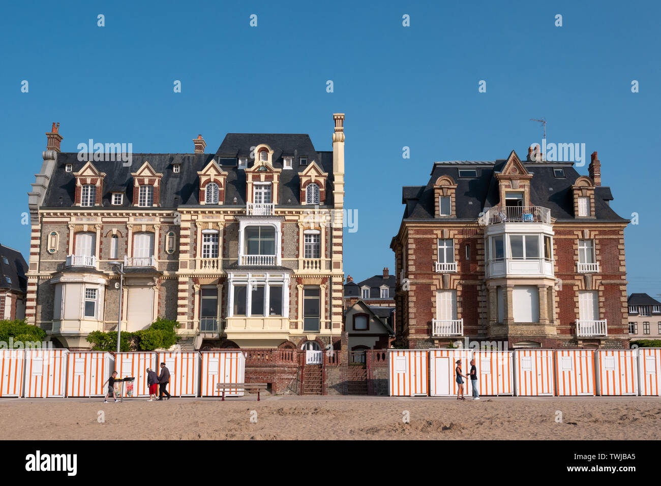 Houlgate, France - June 4, 2019: Typical houses and beach cabins of Houlgate. Stock Photo