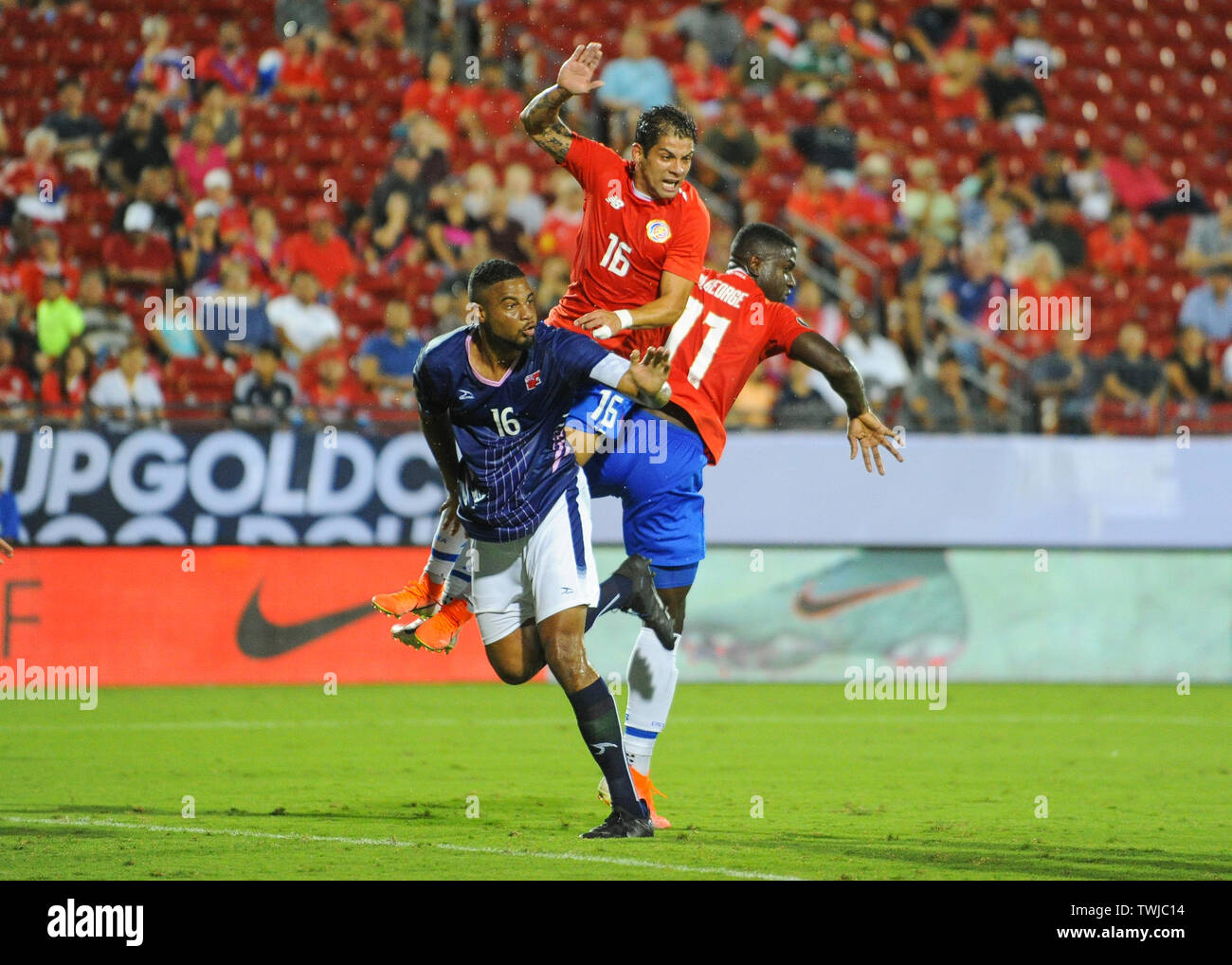 Frisco, TX, USA. 20th June, 2019. Costa Rica defender, Christian Gamboa (16), Costa Rica forward, Mayron George (11), and Bermuda defender, Dante Leverock (16), in front of the goal during 2019 CONCACAF Gold Cup match between Costa Rica and Bermuda, at Toyota Stadium in Frisco, TX. Mandatory Credit: Kevin Langley/Sports South Media/CSM/Alamy Live News Stock Photo