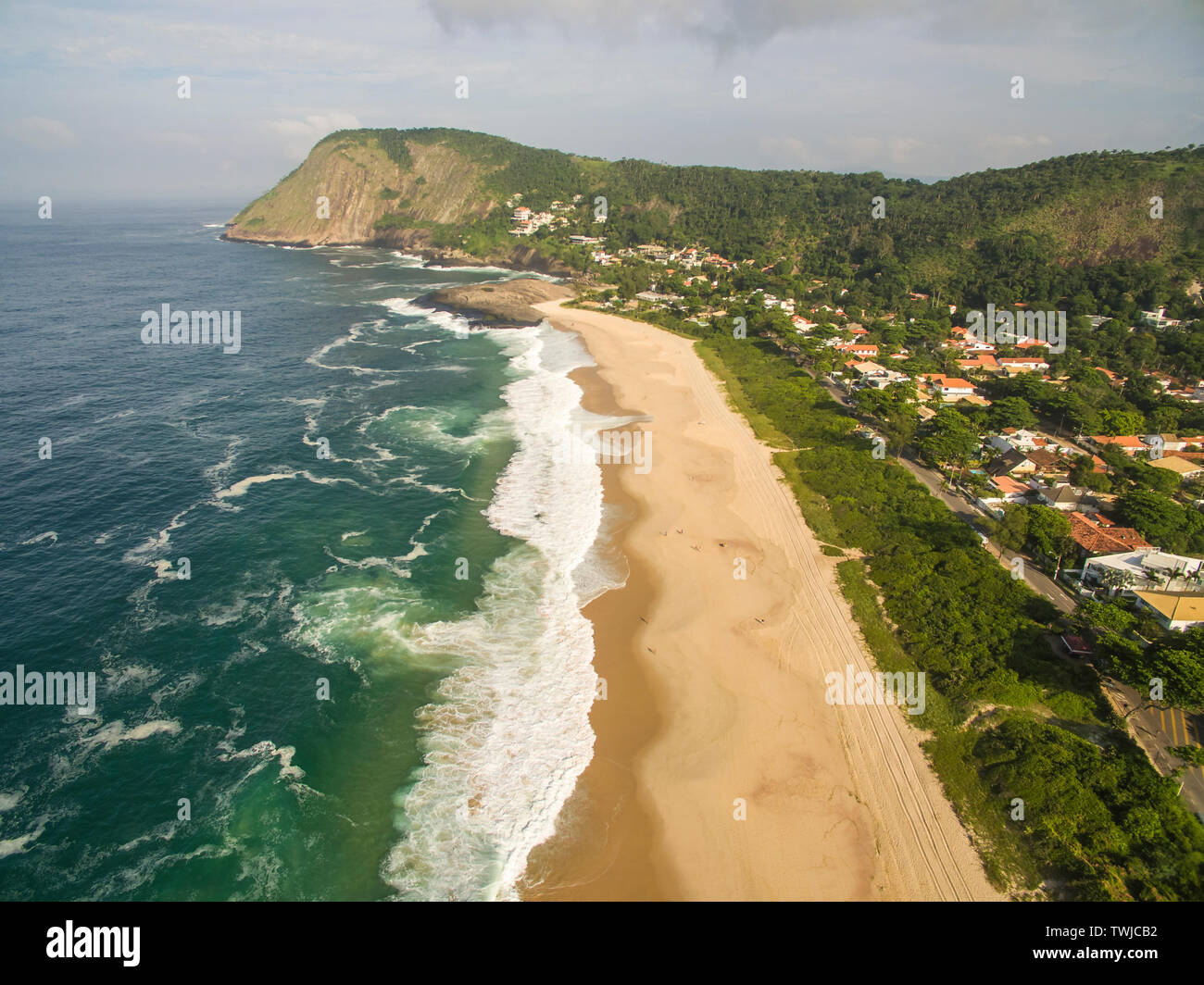 Stone beach and mountain. Beach paradise. Itacoatiara beach. The city of Niteroi, State of Rio de Janeiro Brazil, South America. Stock Photo