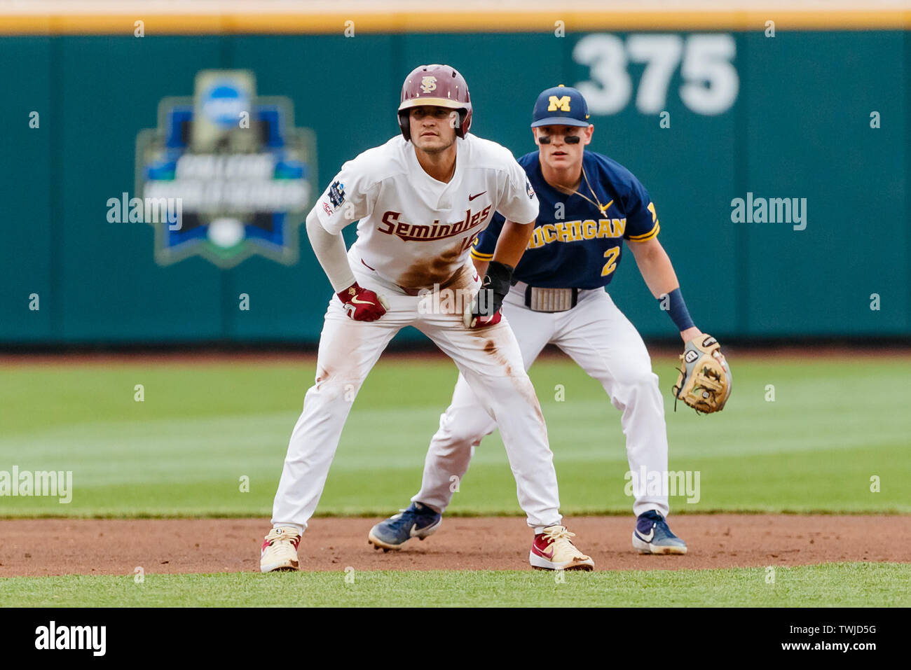 Omaha, NE U.S. 17th June, 2019. Florida State's shortstop Mike Salvatore #16 takes a lead off second base as Michigan's shortstop Jack Blomgren #2 watches in action during game 6 of the 2019 NCAA Men's College World Series between Michigan Wolverines and Florida State Seminoles at the TD Ameritrade Park in Omaha, NE.Attendance: 23,541.Michigan won 2-0.Michael Spomer/Cal Sport Media. Credit: csm/Alamy Live News Stock Photo