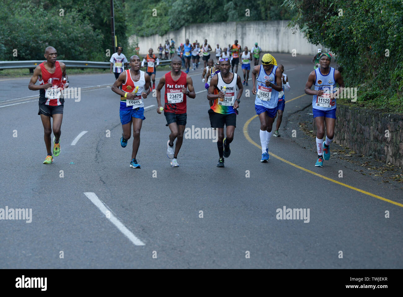 Durban, South Africa, competitive male runners running in 2019 Comrades Marathon, men, sport, action, people, active, fitness Stock Photo
