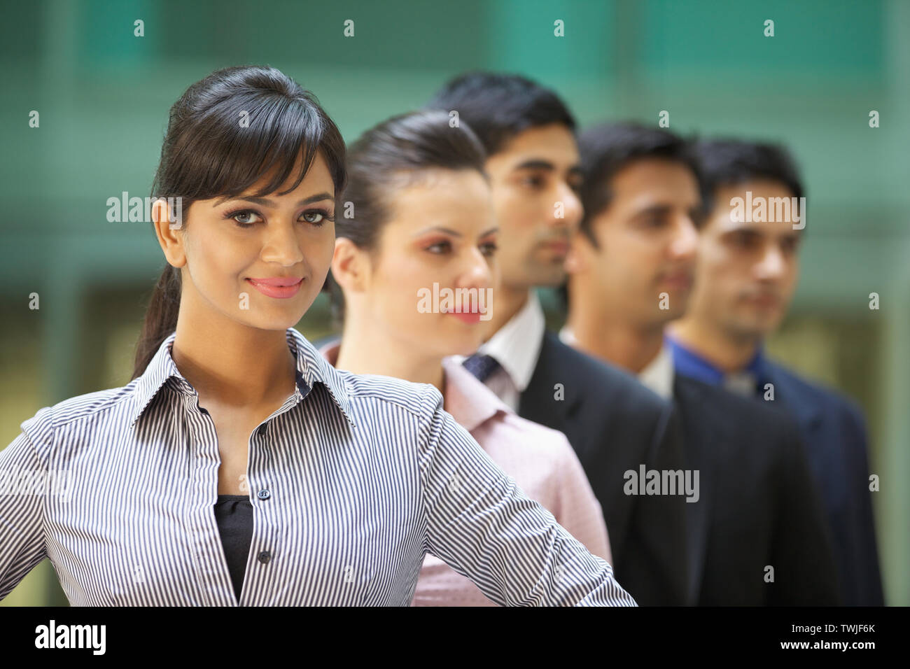 Business executives standing in a row Stock Photo - Alamy