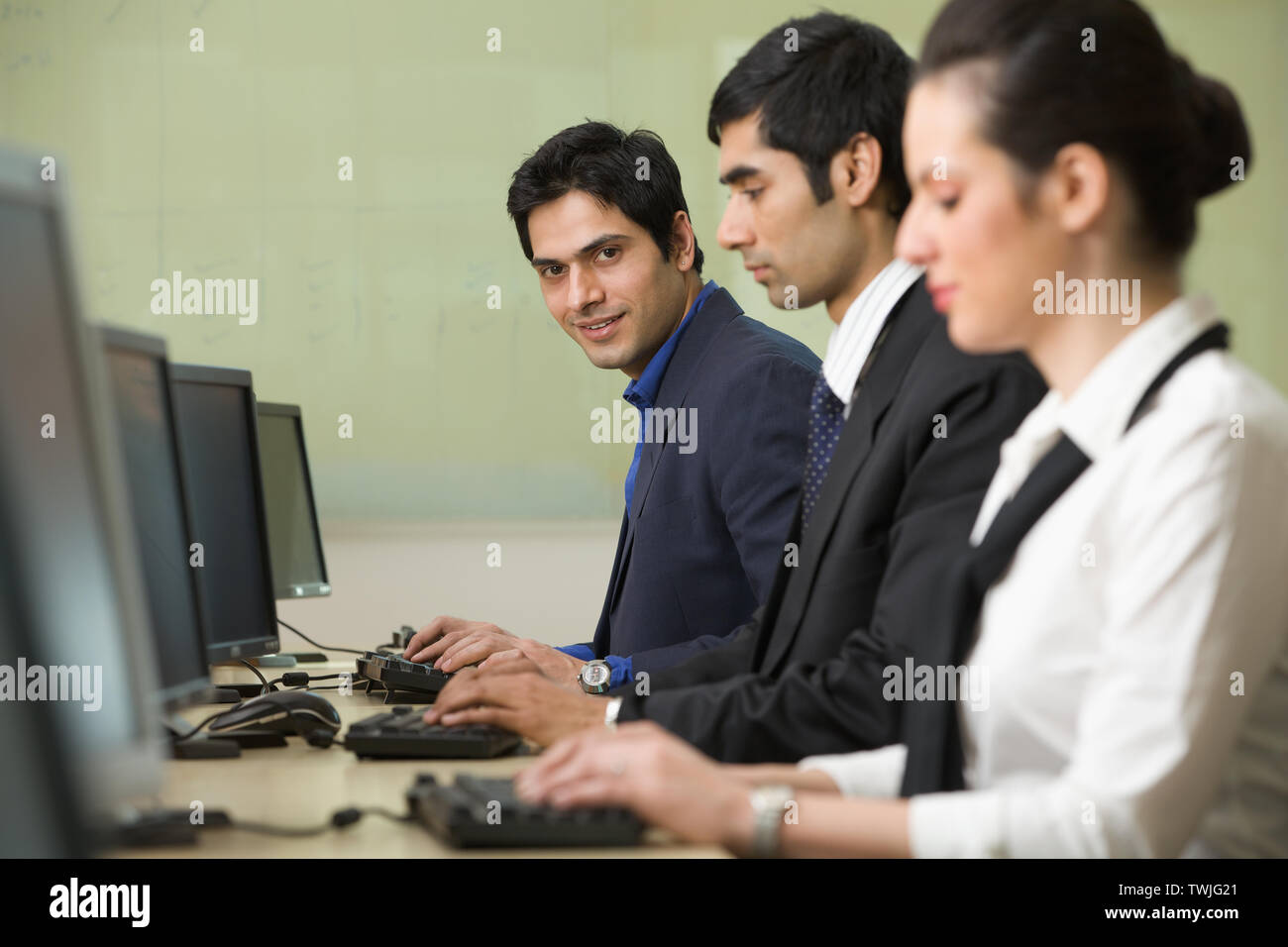 Office workers working in an office Stock Photo