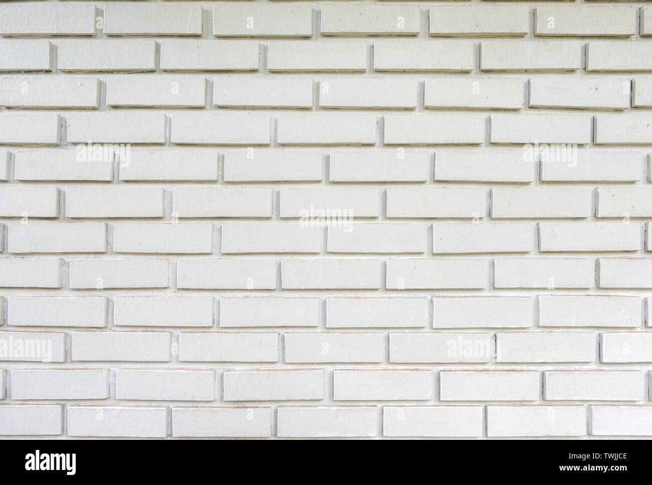 Weathered texture white brick wall background Stock Photo