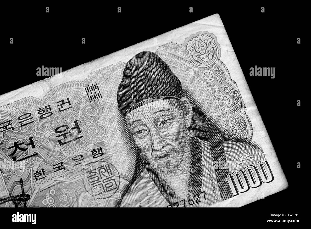 Outdated 1000 Korean Won banknote of 1983 year close up. Black and white Stock Photo