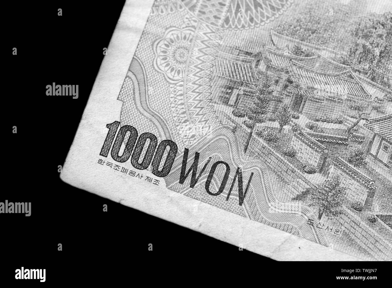 Outdated 1000 Korean Won banknote of 1983 year close up. Black and white Stock Photo