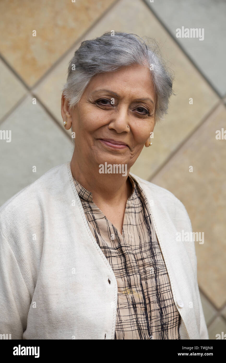 Portrait of old indian woman 70 years hires stock photography and