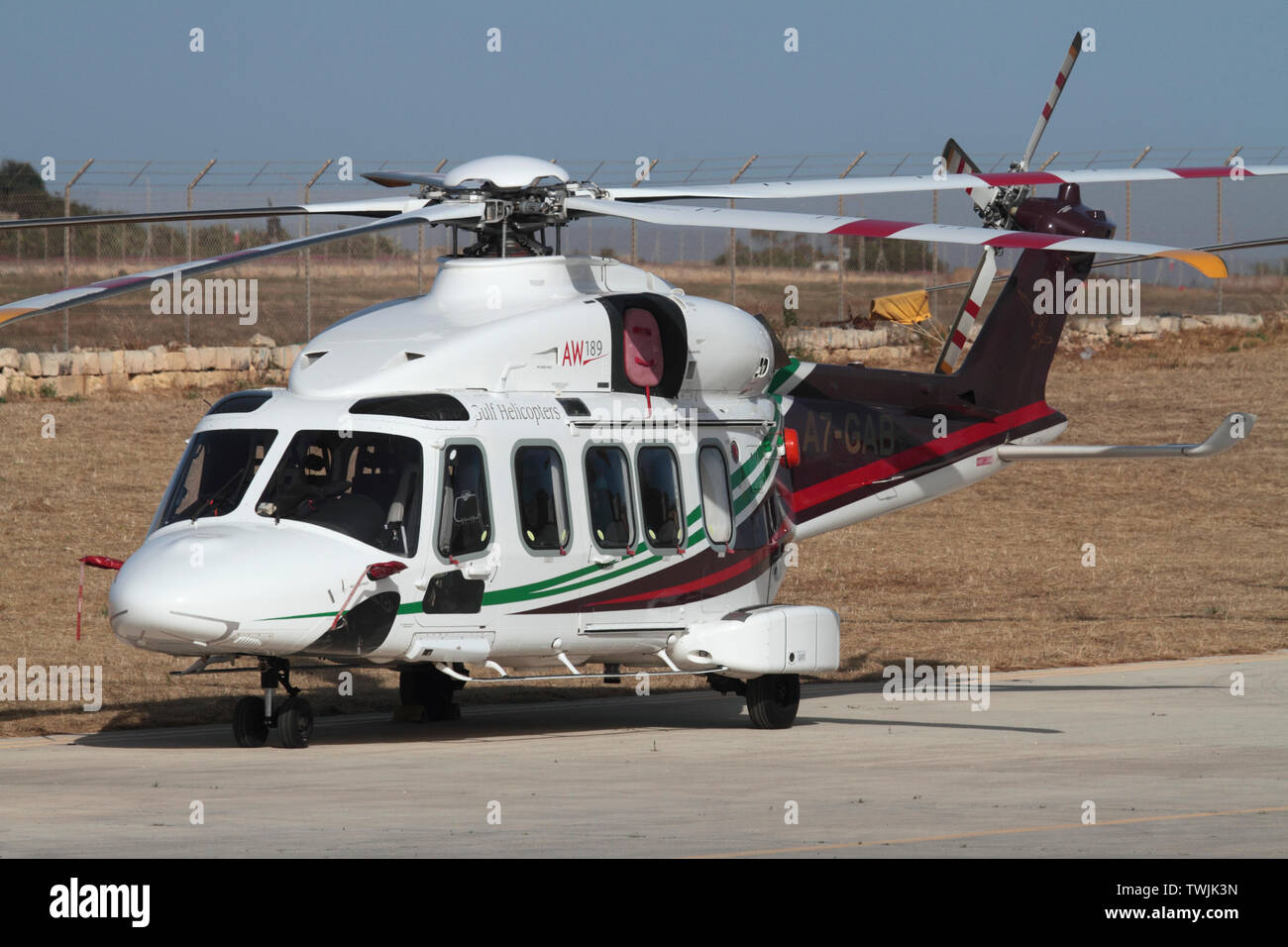 Leonardo (AgustaWestland) AW189 helicopter in the colours of Gulf Helicopters parked on the ground Stock Photo