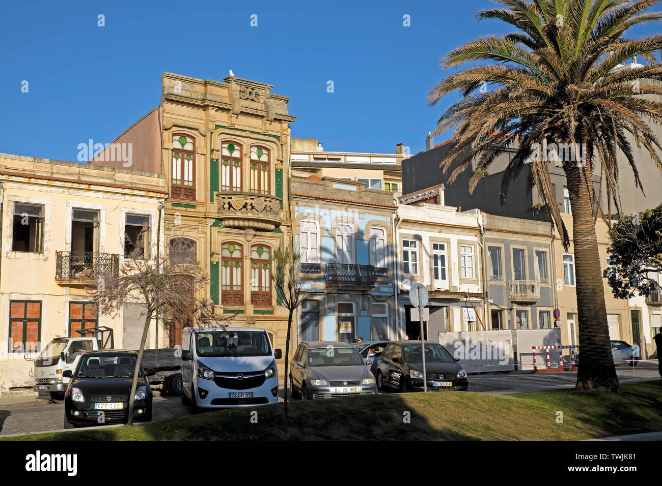 Art Deco facade on building Av. do Brasil Foz de Douro and row of flats apartments and parked cars in Porto Portugal Europe EU  KATHY DEWITT Stock Photo