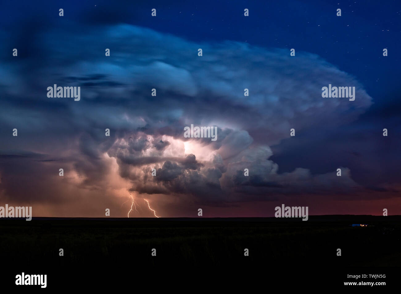 Lightning storm with cumulonimbus and mammatus clouds Stock Photo