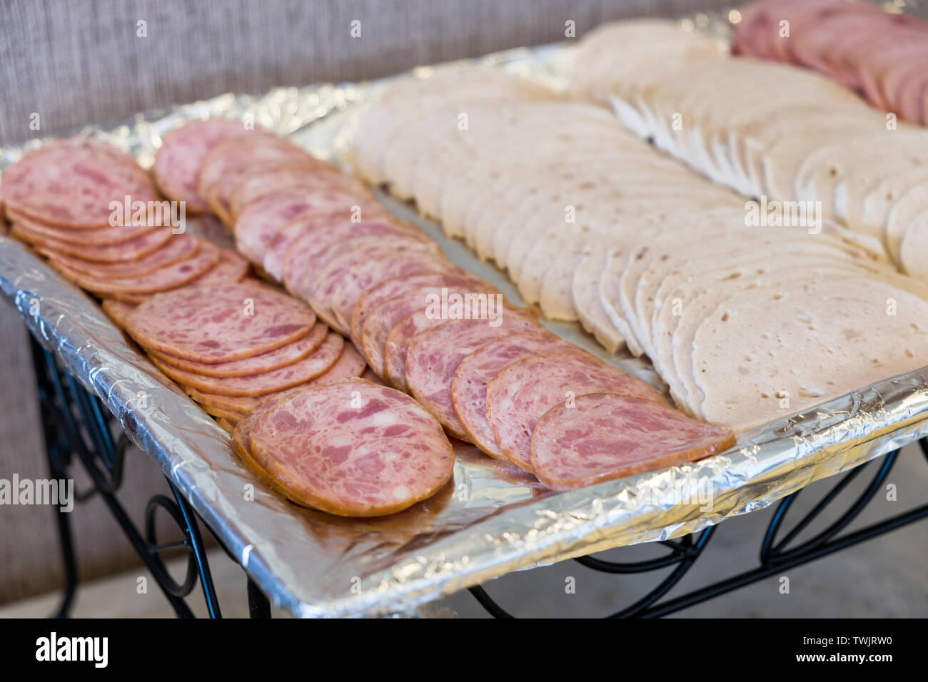 Ham and pork sliced set on tray in breakfast at hotel Stock Photo Alamy