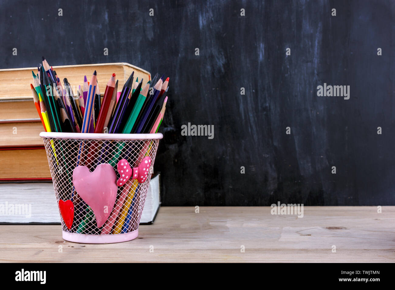 Colored Pencil Eraser Sharpener On Blackboard Stock Photo 1131783836