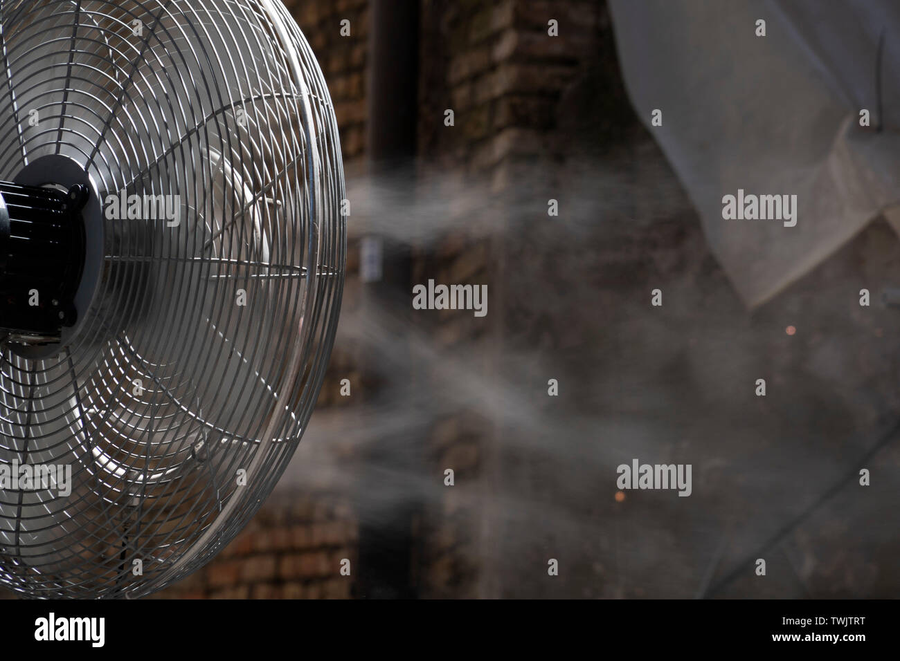 refresher fan with cold water spray detail Stock Photo