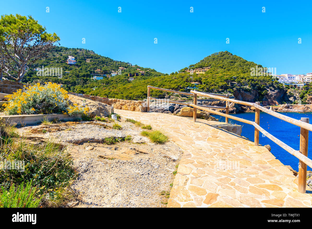 Coastal walkway to beach near Sa Tuna village, Costa Brava, Spain Stock ...