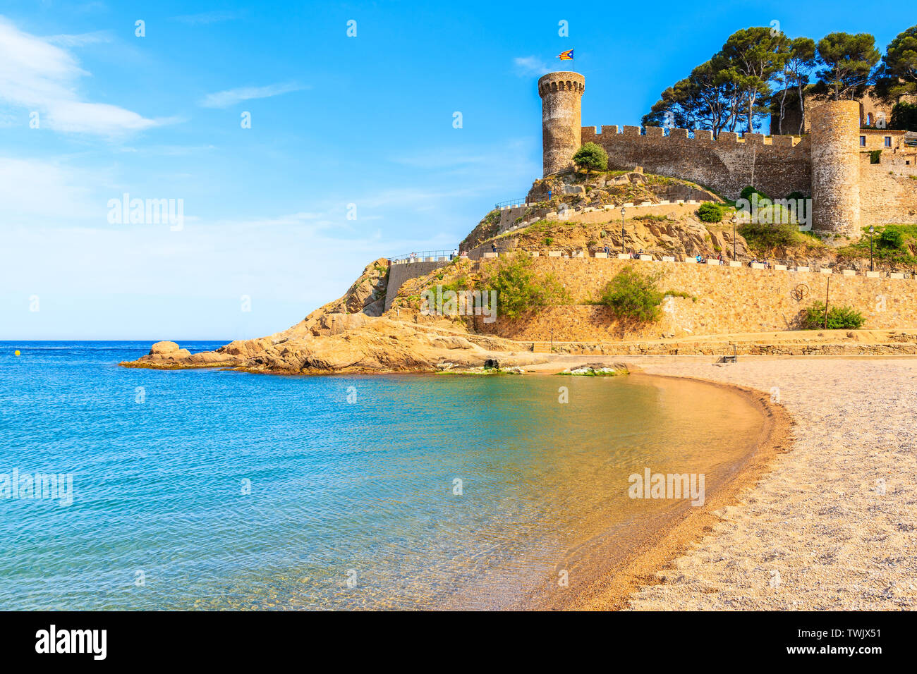 View of Tossa de Mar castle and beach at sunset time, Costa Brava, Spain Stock Photo